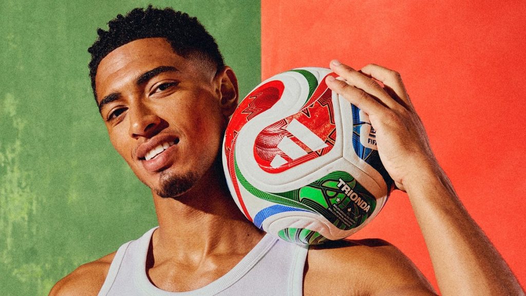 Male model holding the Trionda soccer ball